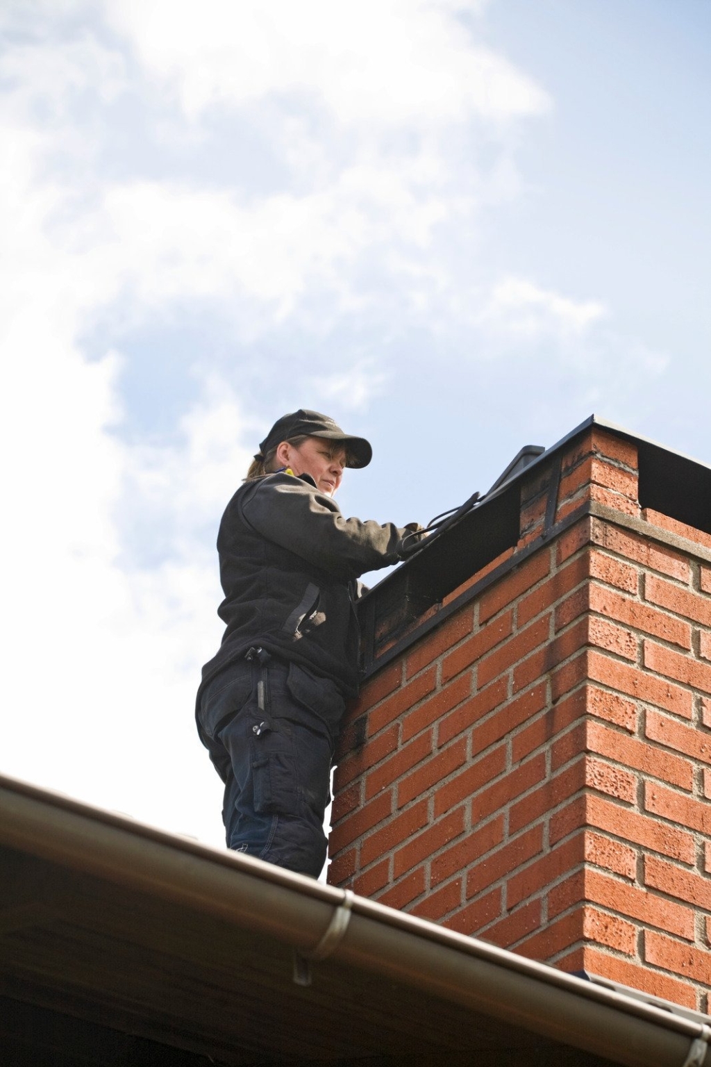 Chimney Inspector completing a chimney inspection on Alexandria, Virgina chimney