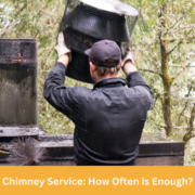 Sixpenny Chimney Sweep technician performing chimney service to ensure a safe and clean fireplace environment.