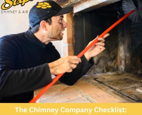 Sixpenny Chimney Sweeps chimney company team cleaning a fireplace flue.