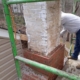 Historic brick home in Alexandria, VA with Sixpenny Chimney Sweeps inspecting the chimney for leaks and maintenance.